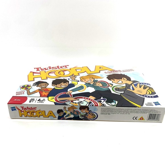 Twister Hoopla Game 5 Games 16 Rings 2 Spinners 4 Twister Ts  Ages 6+ Hasbro NEW - Picture 2 of 4